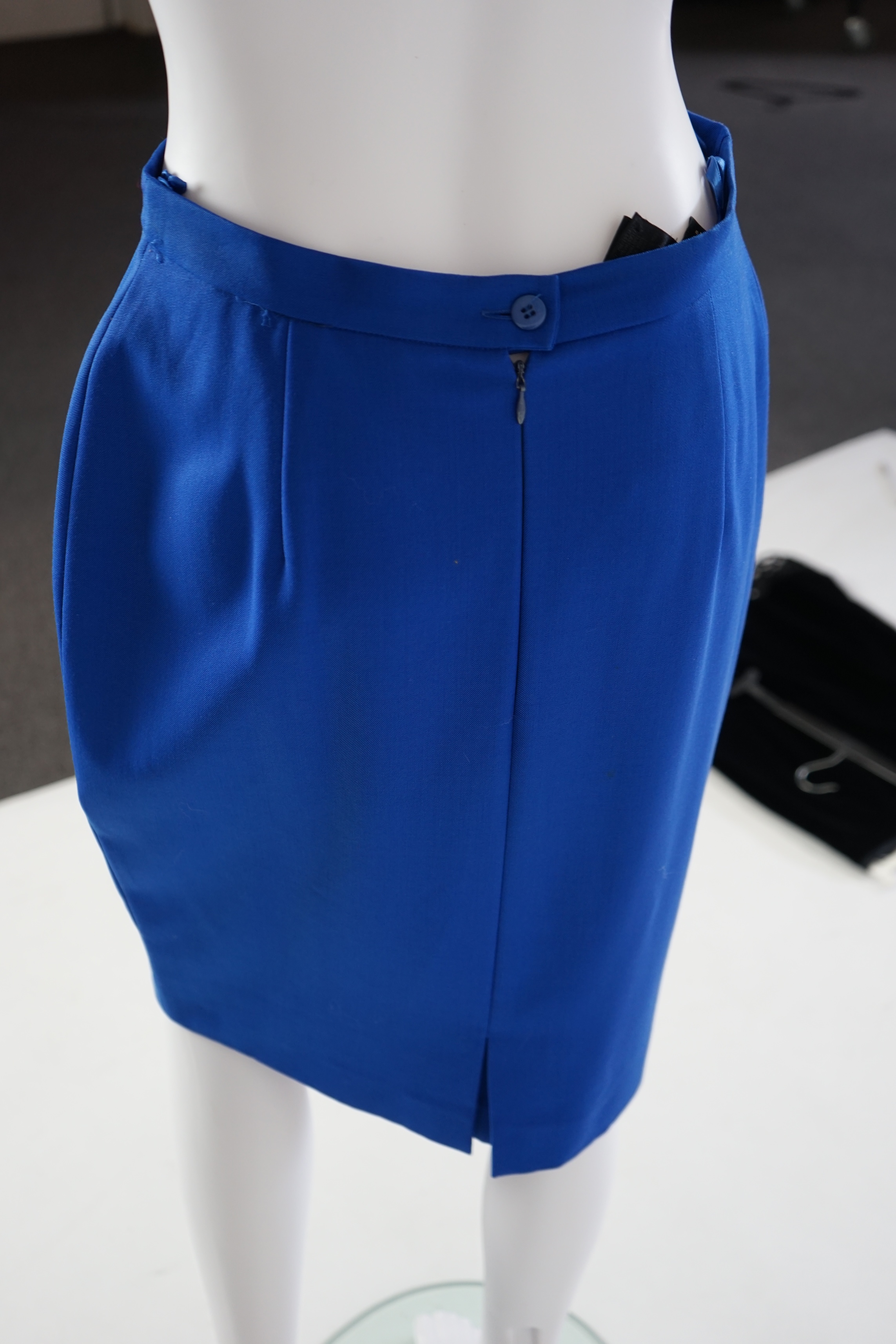 Two Escada skirts and a multi colour silk body blouse. Proceeds to Happy Paws Puppy Rescue